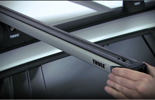 thule slide bar over side of car